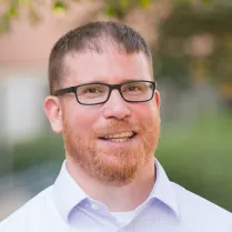 A portrait photo of Kristopher Young, PharmD